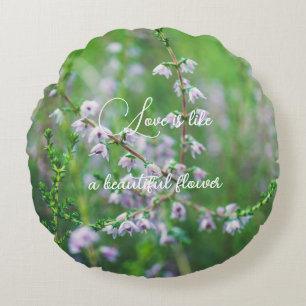 Delicate purple wildflowers round cushion