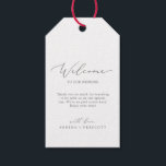 Delicate Silver Calligraphy Wedding Welcome Gift Tags<br><div class="desc">These delicate silver calligraphy wedding welcome gift tags are perfect for a modern wedding. The romantic minimalist design features lovely and elegant silver grey typography on a white background with a clean and simple look. Personalise the tags with the location of your wedding, a short welcome note, your names, and...</div>
