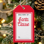 Delivered by Santa Claus Red and White Christmas Gift Tags<br><div class="desc">Add a magical touch to your holiday presents with these fun "Delivered by Santa Claus" red and white gift tags! Featuring a playful design and festive colours, these tags make any gift feel like it’s straight from Santa’s workshop. Perfect for children and adults alike, these tags are a charming addition...</div>
