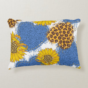 Denim hearts made of fabric with torn edges and le decorative cushion