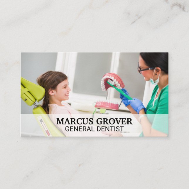 Dentist Showing Little Girl How To Brush Business Card (Front)