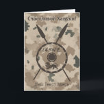 Desert Maccabee Shield And Spears - Russian Holiday Card<br><div class="desc">A military brown "subdued" style depiction of a Maccabee&#39;s shield and two spears on a desert camo background. The shield is adorned by a lion and text reading "Yisrael" (Israel) in the Paleo-Hebrew alphabet. Cyrillic (Russian) text reading, "Счастливой Хануки!" (Schastlivoi Hanuki - Happy Chanukkah) also appears. Add your own additional...</div>