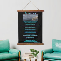 Desiderata Grey Wolves standing by a river bank