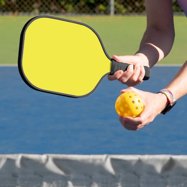 Design with a Yellow Background and Black Border Pickleball Paddle (Insitu)