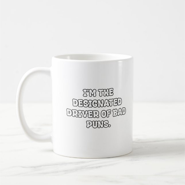 Designated Driver of Bad Puns Typography Coffee Mug (Left)