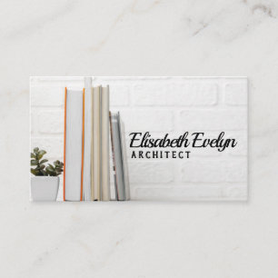 desk with stacked books business card