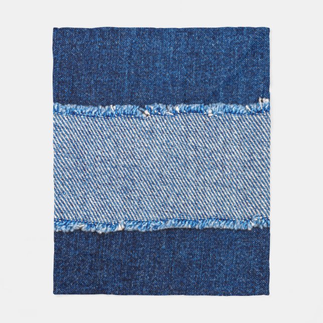Destroyed torn denim blue jeans fabric frame on bl fleece blanket (Front)