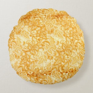 Detail of gold lace pattern fabric of cloth round cushion