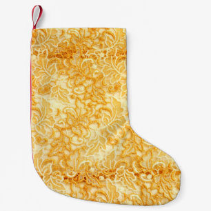 Detail of gold lace pattern fabric of cloth small christmas stocking
