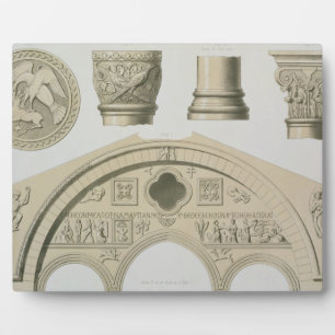 Details of a sculptured arch and columns from St. Plaque