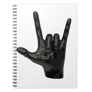 devil horns hand notebook