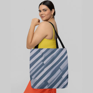 Diagonal grey and blue striped abstract background tote bag