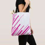 Diagonals in Magenta and White Tote Bag<br><div class="desc">Diagonals in Magenta and White is a minimal design featuring bold magenta diagonal lines on a crisp white background. This eye-catching design is available on many items,  making it perfect for adding a pop of colour and style.</div>