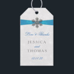 Diamante Snowflake & Blue Ribbon Winter Wedding Gift Tags<br><div class="desc">The diamante snowflake & blue ribbon wedding collection is perfect for any couple planning a romantic winter wedding celebration. The design features a light silvery grey and white snowflake textured background with a diamante snowflake on top of a silky looking ribbon. The wording incorporates the same silvery grey and blue...</div>