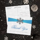 Diamante Snowflake & Blue Ribbon Winter Wedding Postcard<br><div class="desc">The diamante snowflake & blue ribbon wedding collection is perfect for any couple planning a romantic winter wedding celebration. The design features a light silvery grey and white snowflake textured background with a diamante snowflake on top of a silky looking ribbon. The wording incorporates the same silvery grey and blue...</div>