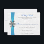 Diamante Snowflake & Blue Ribbon Winter Wedding RSVP Card<br><div class="desc">The diamante snowflake & blue ribbon wedding collection is perfect for any couple planning a romantic winter wedding celebration. The design features a light silvery grey and white snowflake textured background with a diamante snowflake on top of a silky looking ribbon. The wording incorporates the same silvery grey and blue...</div>