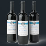 Diamante Snowflake & Blue Ribbon Winter Wedding Wine Label<br><div class="desc">The diamante snowflake & blue ribbon wedding collection is perfect for any couple planning a romantic winter wedding celebration. The design features a light silvery grey and white snowflake textured background with a diamante snowflake on top of a silky looking ribbon. The wording incorporates the same silvery grey and blue...</div>
