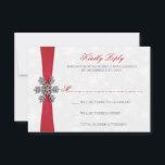 Diamante Snowflake & Red Ribbon Winter Wedding RSVP Card<br><div class="desc">The diamante snowflake & red ribbon wedding collection is perfect for any couple planning a romantic winter wedding celebration. The design features a light silvery grey and white snowflake textured background with a diamante snowflake on top of a silky looking ribbon. The wording incorporates the same silvery grey and red...</div>