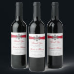 Diamante Snowflake & Red Ribbon Winter Wedding Wine Label<br><div class="desc">The diamante snowflake & red ribbon wedding collection is perfect for any couple planning a romantic winter wedding celebration. The design features a light silvery grey and white snowflake textured background with a diamante snowflake on top of a silky looking ribbon. The wording incorporates the same silvery grey and red...</div>
