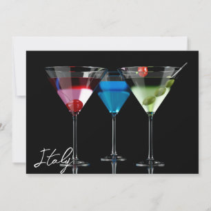 Different cocktails in martini glasses on black