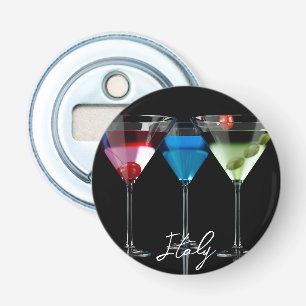 Different cocktails in martini glasses on black bottle opener