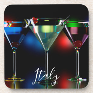Different cocktails in martini glasses with lights coaster