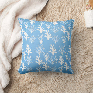 Different white corals on blue background cushion