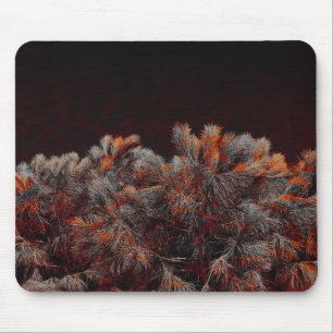 Digital art of pine tree with orange colour spots mouse mat