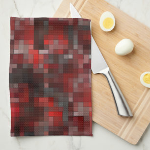 Digital mosaic of squares in red shades and grey tea towel
