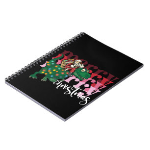 Dinosaur carrying Santa Claus Christmas Notebook