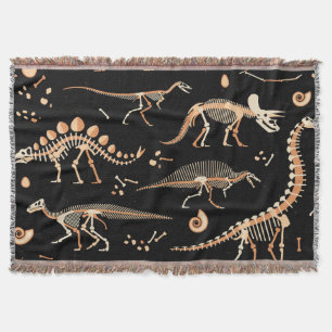 Dinosaur skeletons, fossils, vintage pattern. throw blanket