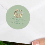 Dinosaur Theme Wedding Sage Green Personalised  Classic Round Sticker<br><div class="desc">Bring a roar of fun to your celebration with these dinosaur-themed sage green and dark green wedding stickers! Featuring an adorable T-Rex bride with a white veil and groom in a black tie on a modern elegant sage green background. Perfect stickers for a whimsical Jurassic wedding reception, rehearsal dinner, or...</div>