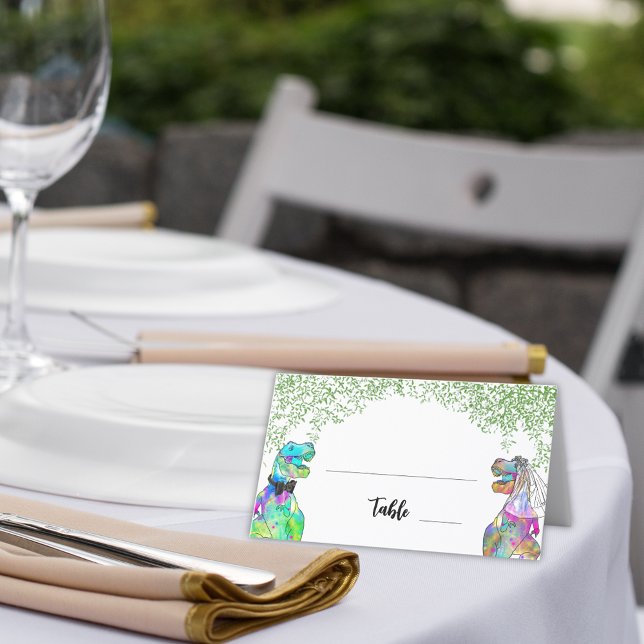 Dinosaur Themed Wedding Foliage Place Card (Colorful dinosaur wedding table place card with T-Rex Bride and Groom with jungle greenery)