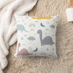 Dinosaurs and the rainbow in the sky. cushion