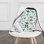 Dinosaurus boys cute all-over print  drawstring bag<br><div class="desc">A cute dinosaurus boys all-over print in a tropical pre-historic setting. Original artwork by Caroline Bonne Müller</div>