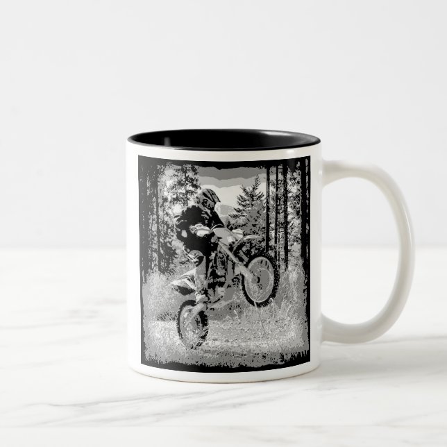 Dirt bike wheeling in the woods Two-Tone coffee mug (Right)