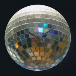 Disco Ball clock<br><div class="desc">NOTE: This clock is not 3D. It is a 2D photographic image of a disco ball. 

 disco,  "disco ball",  ball,  discoball,  dance,  hall,  dancing,  dancer,  night,  club,  nightclub,  "night club",  clubbing,  fun,  whimsy,  whimsical,  cool,  funny,  humour,  humourous,  silver,  funky,  groovy,  music,  musical,  party,  partying,  parties, </div>