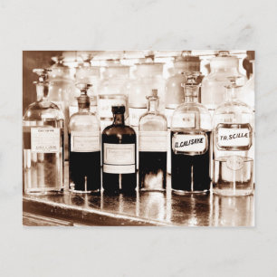 Display of apothecary bottles containing drugs postcard
