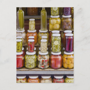 Display of pickled fruits and vegetables. postcard