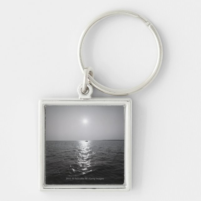 Distant boat on ocean key ring (Front)