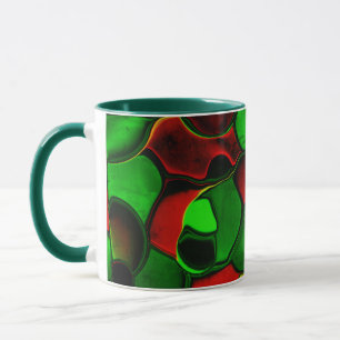 Distorted and strange shapes, red and green colors mug