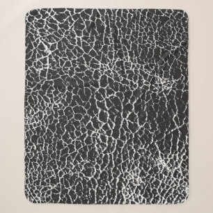 Distressed overlay texture of crocodile or snake s sherpa blanket