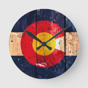 Distressed rustic wooden Colorado state flag Round Clock