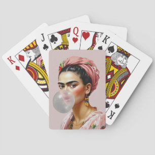 Diva with floral scarf blowing bubble gum playing cards