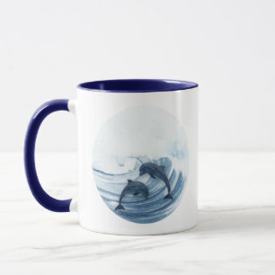 Diving dolphins in the surf mug