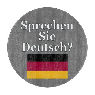 Do you speak German? in German. Flag Cutting Board