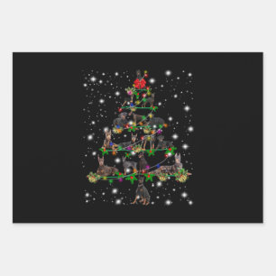 Doberman Christmas Tree Covered By Flashlight Wrapping Paper Sheet