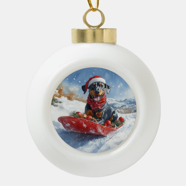 Doberman Dog in Sledge Let it Snow Christmas Ceramic Ball Christmas Ornament (Front)