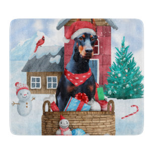 Doberman Dog In snow Christmas Dog House Cutting Board