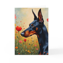 Doberman in a field of flowers